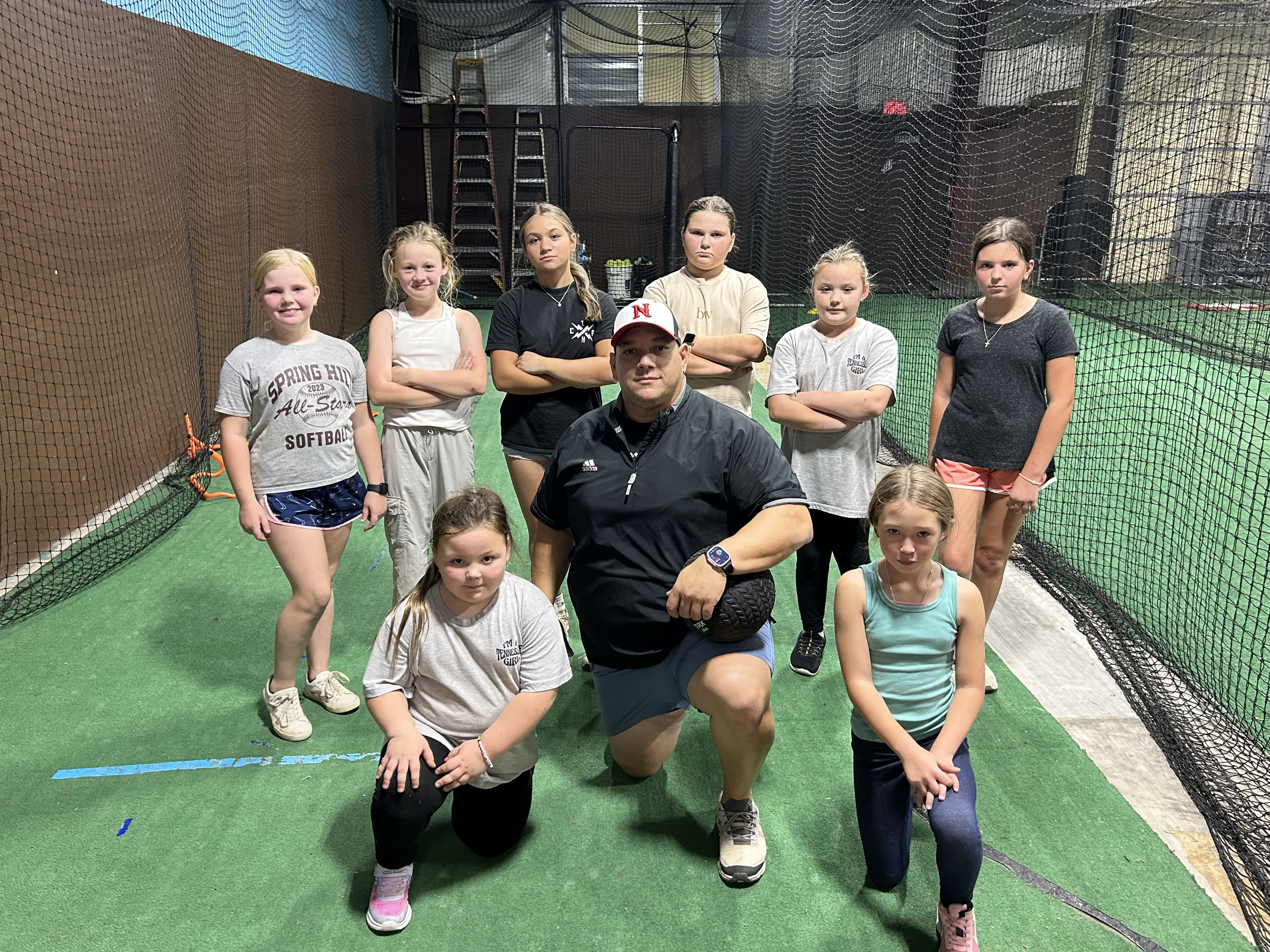 Coach Pedro with student